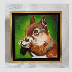 8"x8" Acrylic Painting of 'Arthur a Beer Drinking Squirrel'.  Framed in a Gold Floater frame