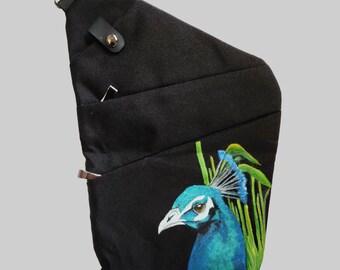 Slim Crossbody Travel Bag with hand painted portrait of Oscar the Peacock