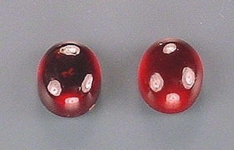two 10x8 oval garnet cabochon gem stone gemstone