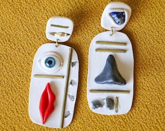 Surrealistische Gesichts-Collage-Ohrringe (blaues Auge)