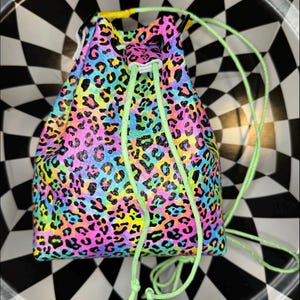 The Wombler! Paracord drawstring bucket bag! Hand sewn leather crossbody catch all purse!