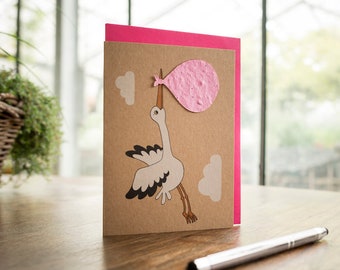 Karte zur Geburt "Der Storch" | Glückwunschkarte mit Saatpapier-Beutel zum Einpflanzen | Enthält 10 verschiedene Wildblumensamen