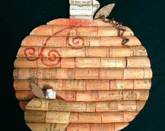 pumpkins wall hanging made from recycled corks