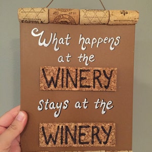 Sign made with recycled corks - &quot;What happens at the WINERY stays at the WINERY&quot;