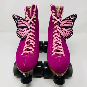 Sparkly pink monarch butterfly skate wings