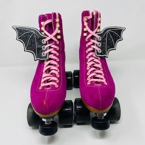 Sparkly black bat skate wings