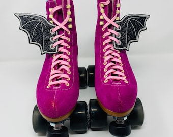 Sparkly black bat skate wings