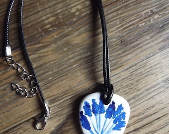 Floral, hand painted ceramic pendant with black cord necklace