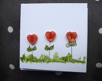Pretty heart flower  card- handmade with watercolour and pretty pastel coloured heart buttons.  3 x 3 inches with envelope.