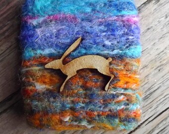 Moorland inspired brooch with leaping hare . Pennine landscape brooch. Hand felted pin.