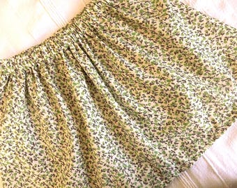 Toddler skirt - Age 3 to 4   Green floral.  Pretty with elasticated waist.