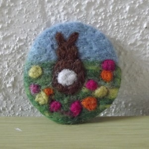 Little brown Easter bunny in a field needle felted brooch - made to order