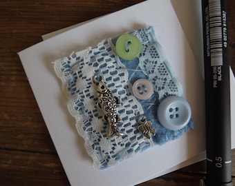 Handmade Mixed Media Card. Fabric Art with buttons and fish charms. "Gone Fishing".