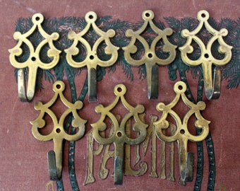 7 Vintage French cast brass metal hooks, ornate embossed design, light brass, coat hook, Hardware, wall hanging, clothes hook, restoration