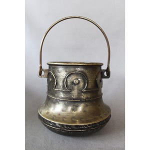 Large vintage iron and metal cauldron pot or planter, iron handle, folk art style, rustic design, embossed, jardiniere, home garden decor