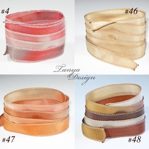 May include: Four different colors of ribbon, each with a different color gradient. The ribbons are all folded in a similar way, with the ends of the ribbon overlapping. The ribbons are labeled with numbers 4, 46, 47, and 48.