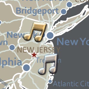 May include: A map of the northeastern United States, highlighting New Jersey with two musical note pins. One pin is gold, the other is silver. The map includes city names and a red star marking Trenton.