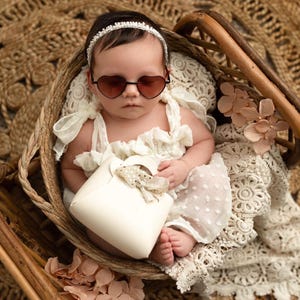 May include: A set of three ceramic mugs with a speckled, matte finish. The mugs are in shades of cream, light gray, and dark gray. Each mug has a simple, minimalist design, perfect for coffee or tea.