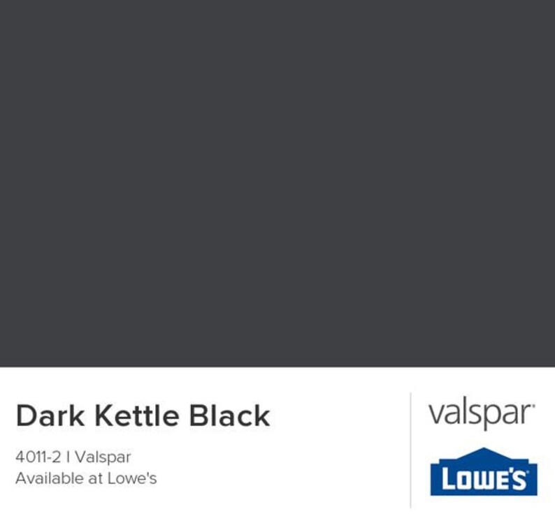 May include: Dark Kettle Black paint color swatch from Valspar, available at Lowe's. The color is a deep, dark gray.