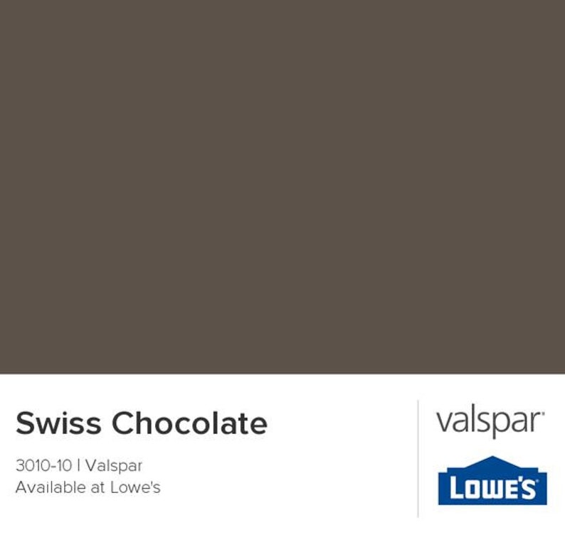 May include: Swiss Chocolate paint color swatch, a dark brown shade, with the Valspar logo and the text "3010-10 | Valspar Available at Lowe's".