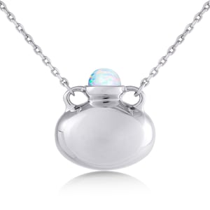 May include: A silver necklace with a small, round, iridescent opal stone set in a silver pendant shaped like a vase.