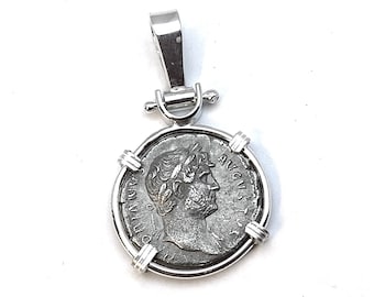 Coin bezel for smaller coin.