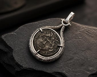 Handmade silver coin bezel.