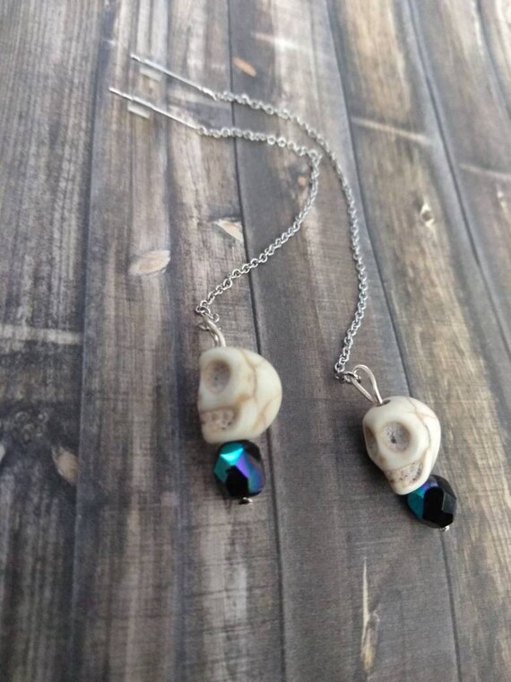 Items similar to Dangle earrings thread earrings skulls free shipping on Etsy