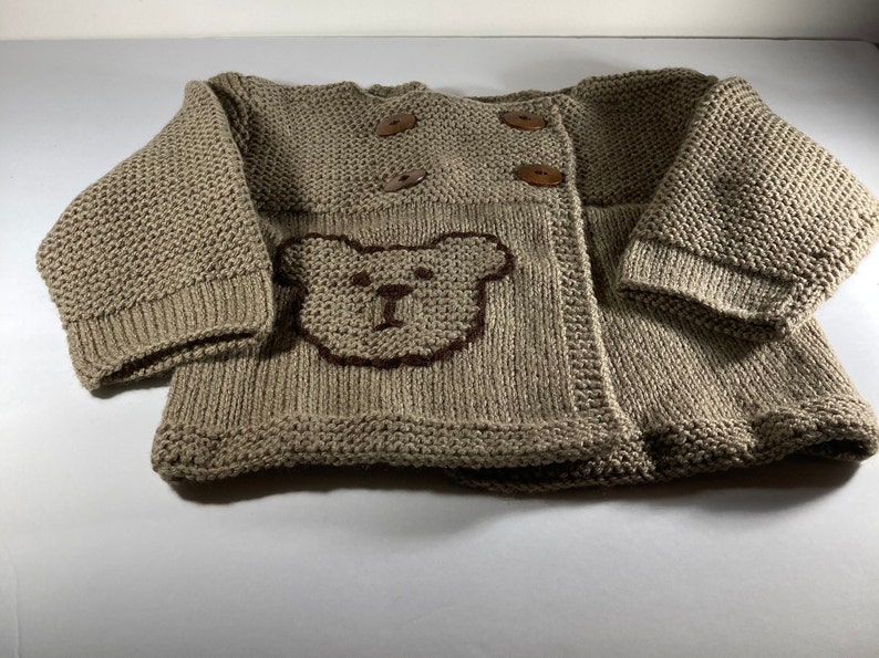 A lovely hand knit sweater with a bear applique image 1