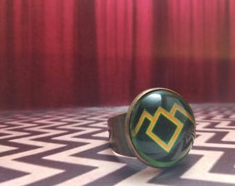 Unveil the Dark Secrets of the Black Lodge with the Twin Peaks Owl Symbol Ring