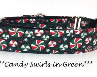 May include: A dark green dog collar featuring a repeating pattern of red, white, and green candy swirls and white snowflakes. The collar has silver metal hardware and the text "Candy Swirls in Green".