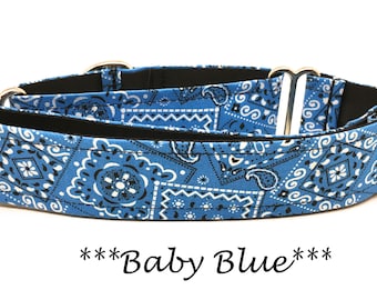 May include: A blue and white bandana print dog collar with silver buckles. The collar is labeled "***Baby Blue***".