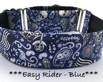 May include: Blue dog collar with a paisley and motorcycle pattern. The collar features a repeating design of white paisley, skulls, motorcycles, and American flags on a blue background. The text "Easy Rider - Blue" is at the bottom.