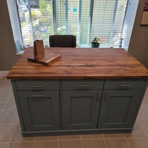 Custom kitchen island with overhang for seating. Kitchen cabinet storage. Handcrafted furniture. Made in USA. Made to order and custom built kitchen island. Heirloom quality furniture