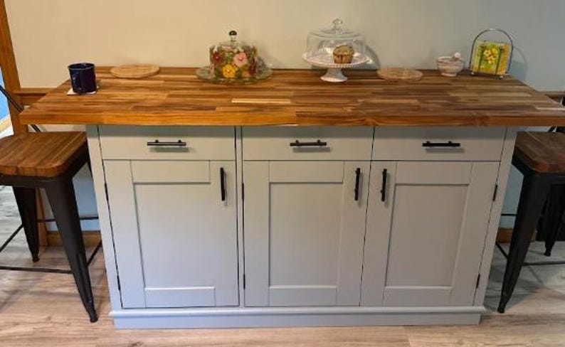 Custom kitchen island with overhang for seating. Handcrafted furniture. Made in USA. Made to order and custom built kitchen island. Heirloom quality furniture