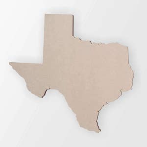 May include: A tan-colored wooden cutout in the shape of the state of Texas. The cutout has a smooth surface and is set against a white background. The edges of the cutout are slightly darker.