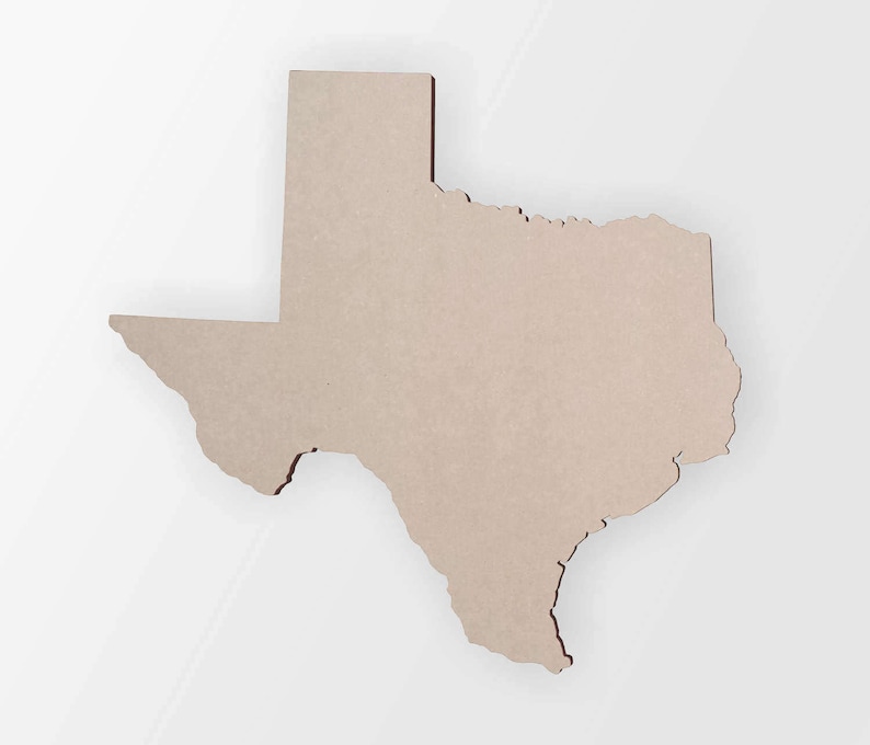 May include: A tan-colored wooden cutout in the shape of the state of Texas. The cutout has a smooth surface and is set against a white background. The edges of the cutout are slightly darker.