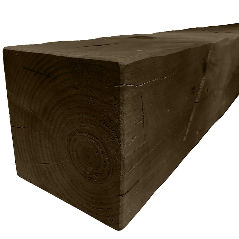 Puede incluir: Una viga de madera marr&oacute;n oscuro con un nudo en el centro. La viga es de madera toscamente tallada y tiene un aspecto r&uacute;stico.