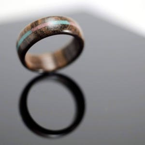 Wooden ring with stone inlay