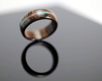 Wooden ring with stone inlay