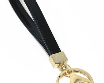 Black leather Wristlet Key fob with gold keyring and lobster claw