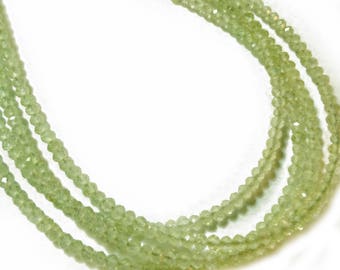Prehnite 2.5mm micro-faceted rondelles. Select a strand length.