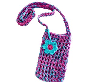 May include: A small pink and blue crocheted crossbody bag with a blue flower accent. The bag has a long strap and is perfect for carrying small items.