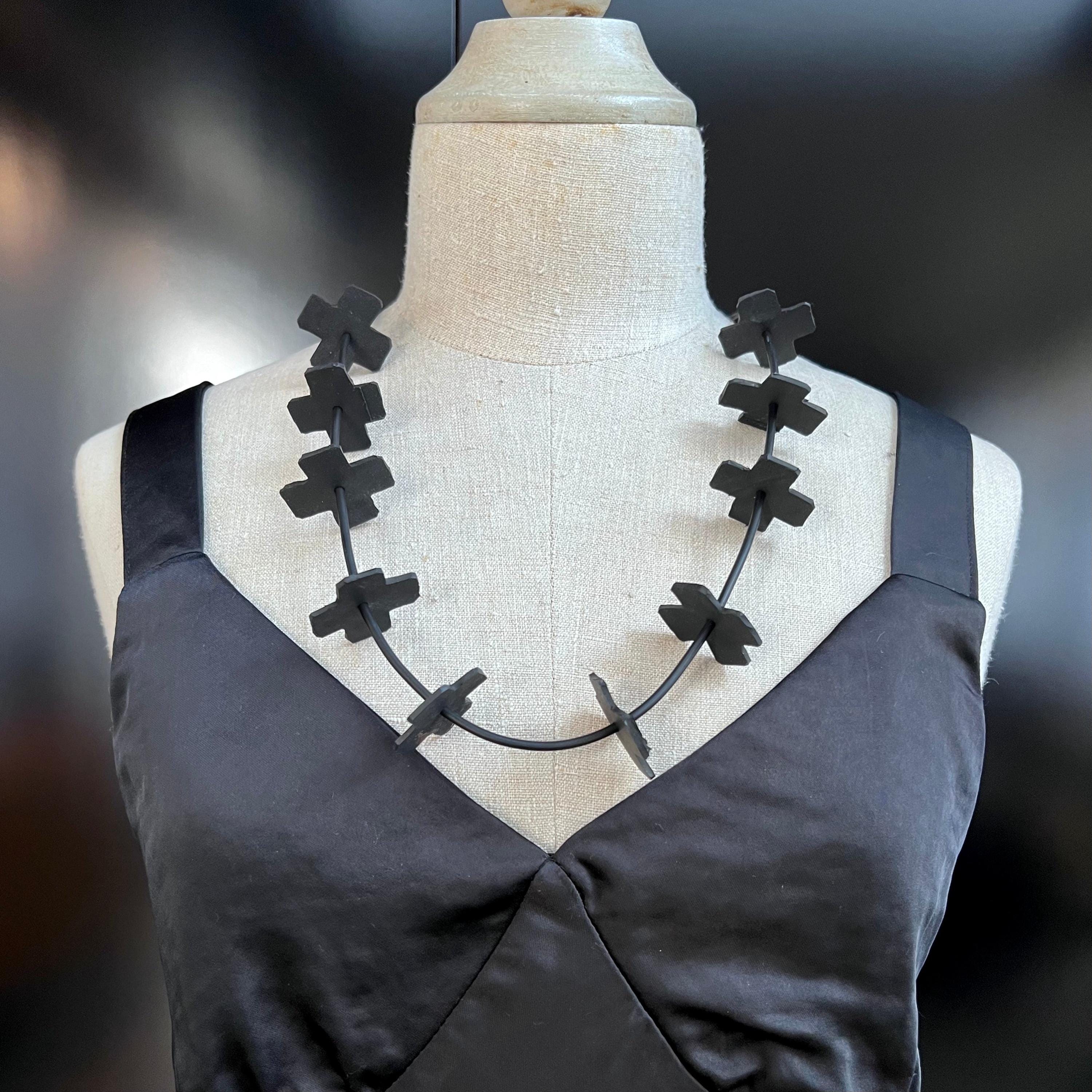 Reclaimed Rubber Cross Necklace: Sustainable Handmade Statement Jewelry