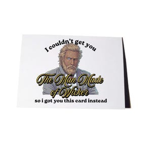 May include: A white greeting card featuring a graphic illustration of a blonde man with a wicker-textured face and beard, wearing a grey suit. The text reads: I couldn't get you The Man Made of Wicker so i got you this card instead.