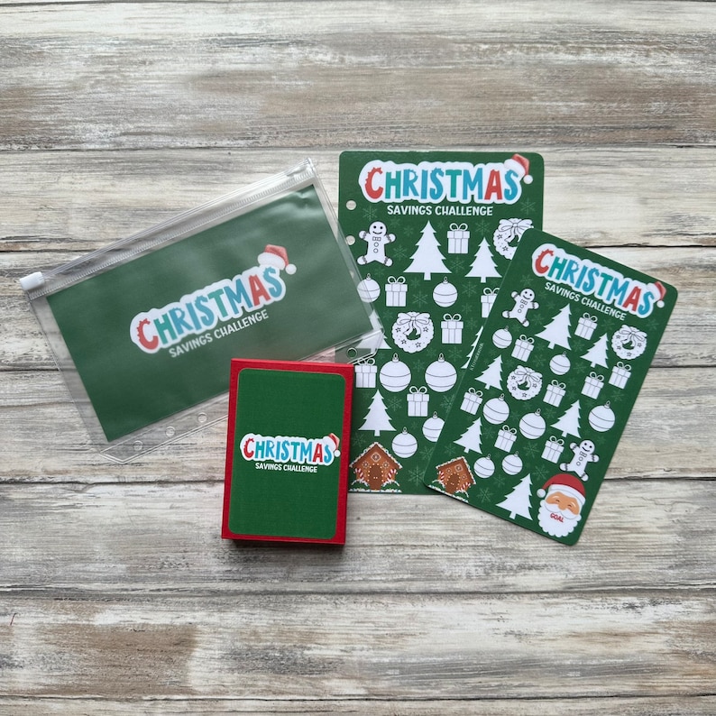 May include: A set of three green and red Christmas savings challenge trackers. Each tracker features a green background with white Christmas icons and the text "Christmas Savings Challenge".