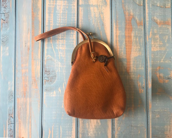 caramel clutch bag