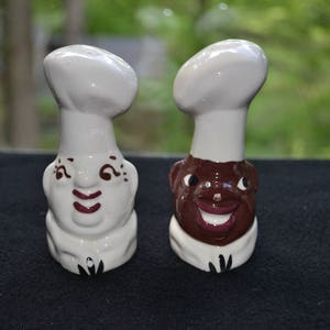 Pair of salt and pepper shakers in form of Mammy and Chef