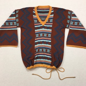 1970&#39;s, V-neck, 3/4 bell sleeve, drawstring bottom, sweater, in brown with mustard, magenta, white and blues