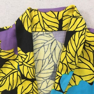 1990's, puffy shoulder, cropped jacket and dropped yoke, mini-skirt set, in colorful, African, floral print image 4